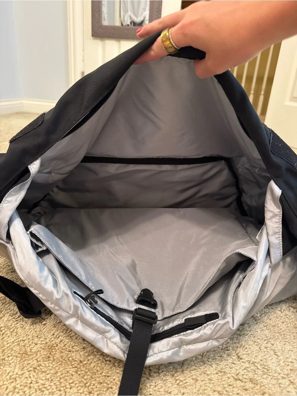 Patagonia Black Messenger Bag with Silver Reflective Strip